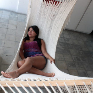 Marta lying in dreamcatcher hammock