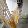 yellow net hammock GUA City _ loft wall