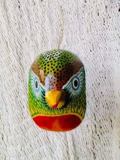 Traditional mayan mask in wood - representing a Quetzal