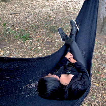 Close up view of large black hammock with Macrame in a park in Guatemala