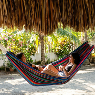 Multicolor Hammock_Two girls laughing Paredon Sideview Mayan Rainbow colors large