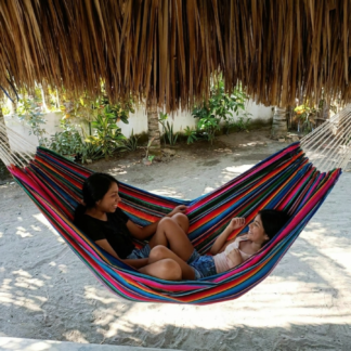 Multicolor Hammock Two girls laughing Paredon upview Mayan