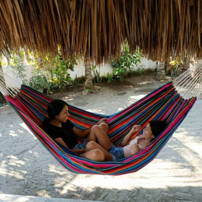 Multicolor Hammock Two girls laughing Paredon upview Mayan